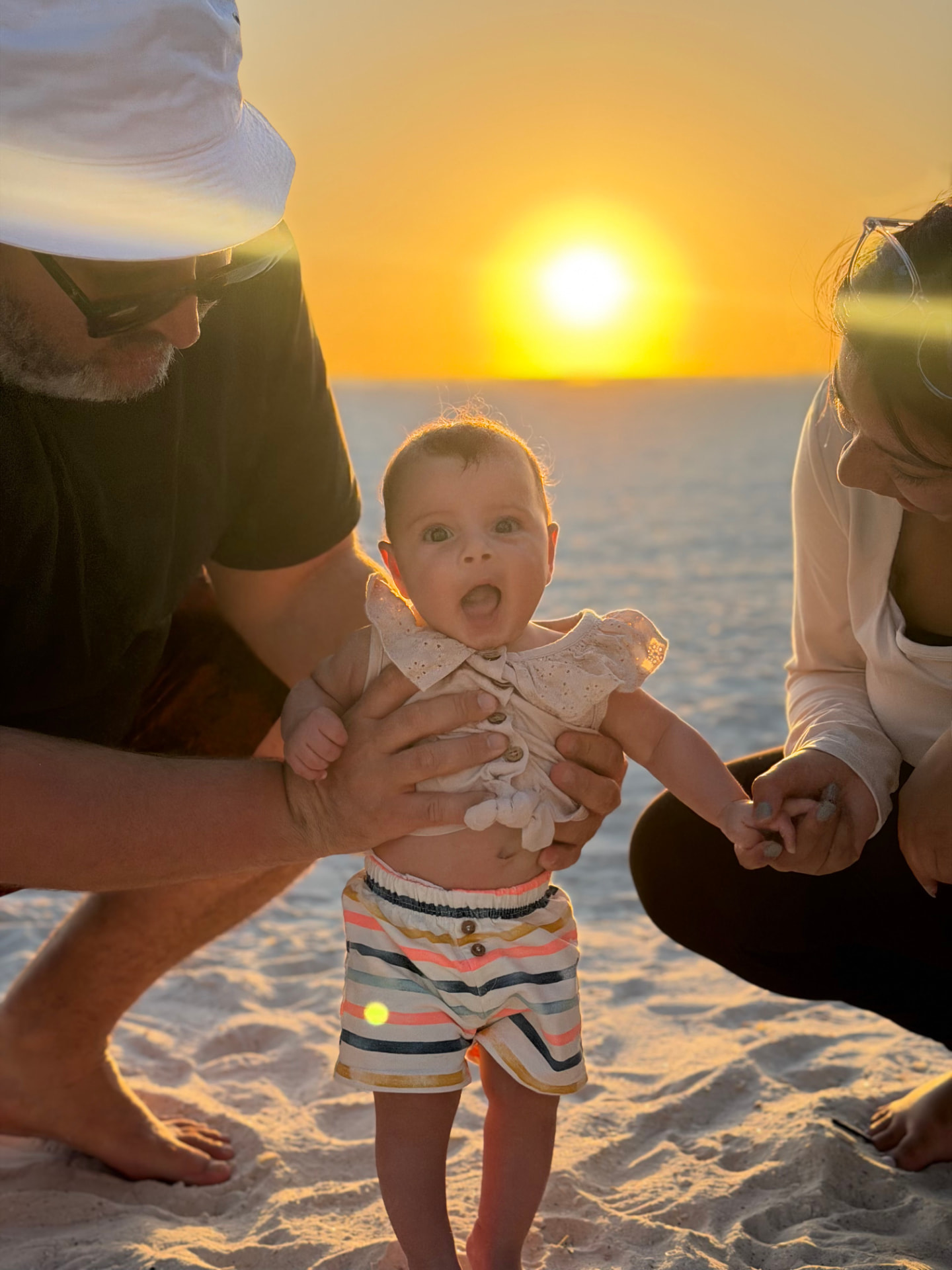 Baby at sunset on the beach